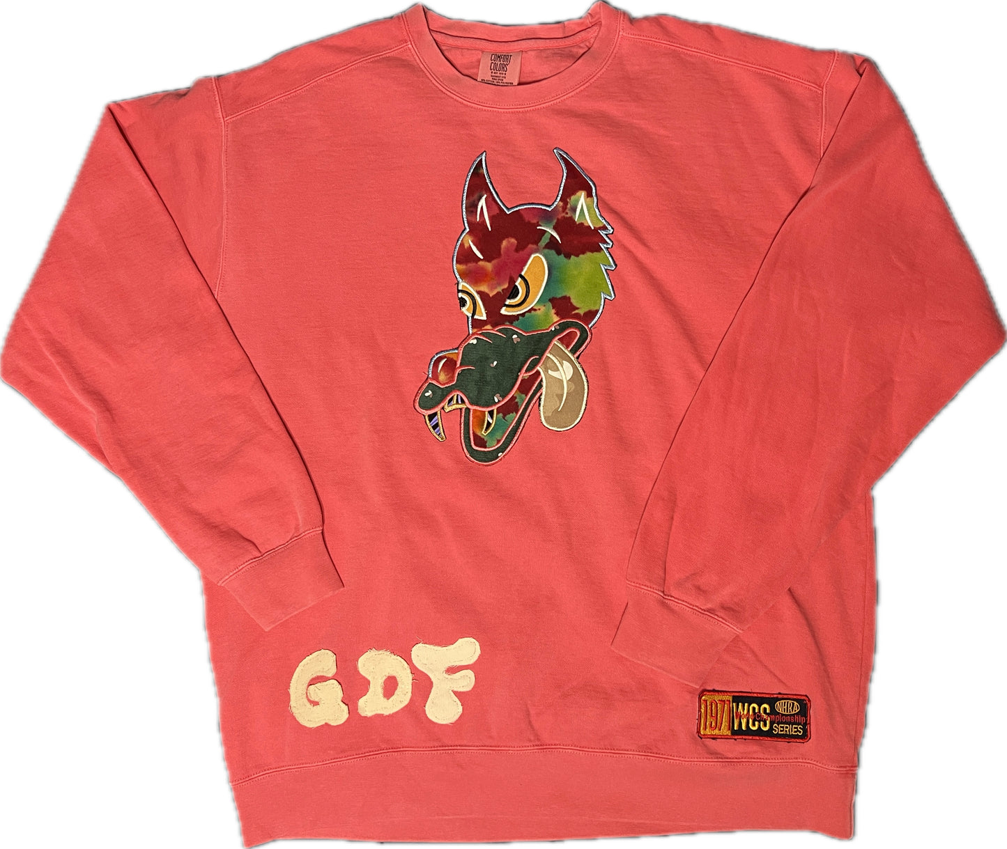 size XL watermelon color crewneck with wolf appliqué patch